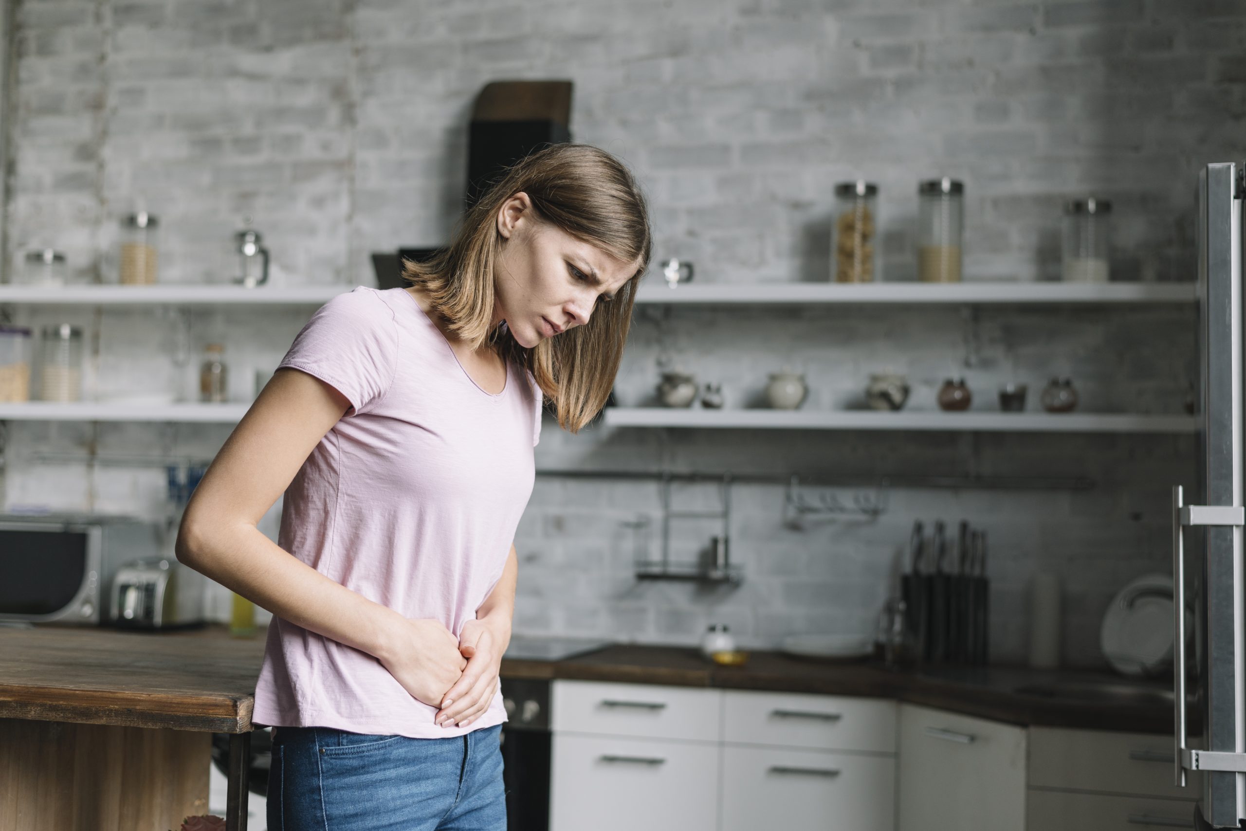 women suffering IBS gut pain