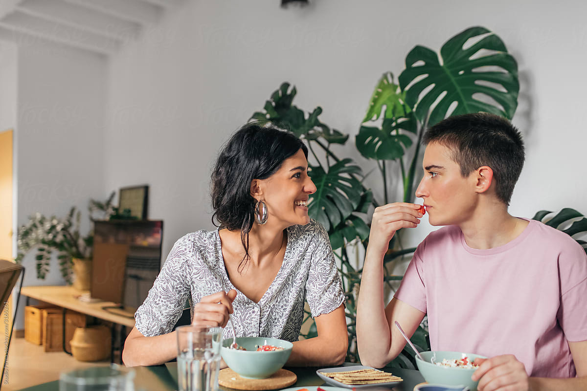 two woman eating healthy food